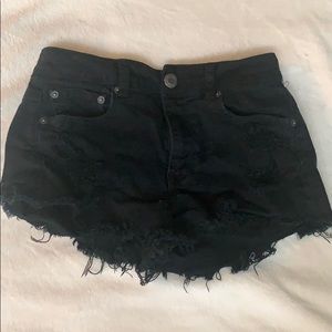 Distressed black cut off shorts